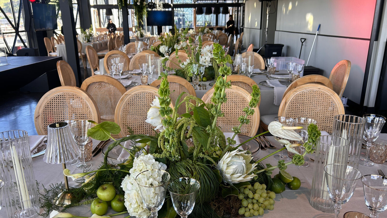 Rooftop gala banquet styled in white and green